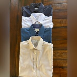 Bundle of Men’s dress shirts. Size L. Long sleeve